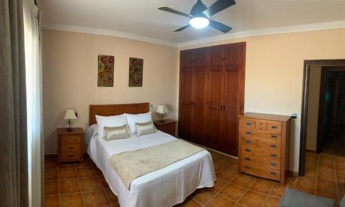 Katil atau katil-katil dalam bilik di Casa de María