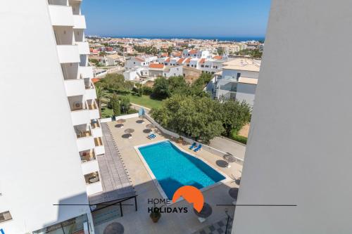a view from the balcony of a apartment with a swimming pool at #048 Sea and City view with Pool, AC in Brejos