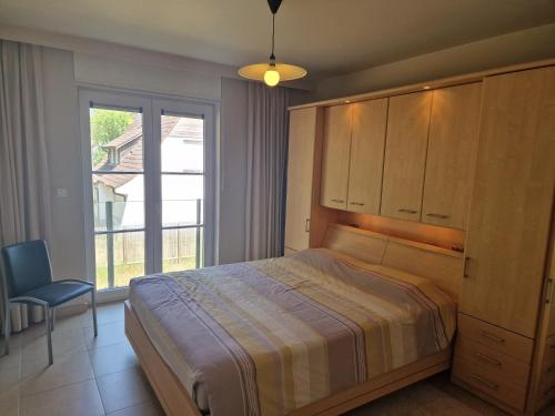 Oostduinkerke Apartments 2にあるベッド