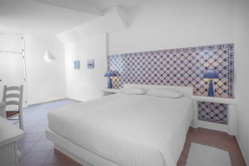 Postel nebo postele na pokoji v ubytování Quinta Paraiso da Mia-Tastefully decorated T1