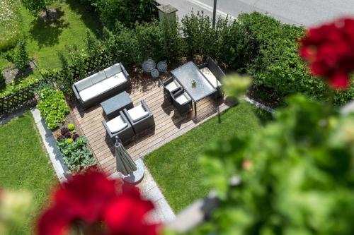 Κήπος έξω από το Adlhof Apartments