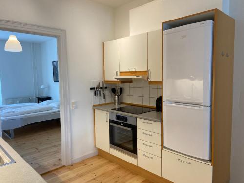 Cuisine ou kitchenette dans l'établissement Vesterbro Apartments 8