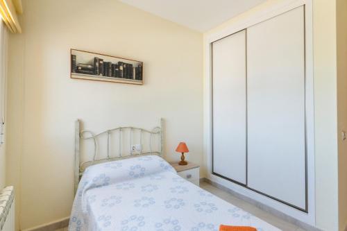 Postel nebo postele na pokoji v ubytování La Cala
