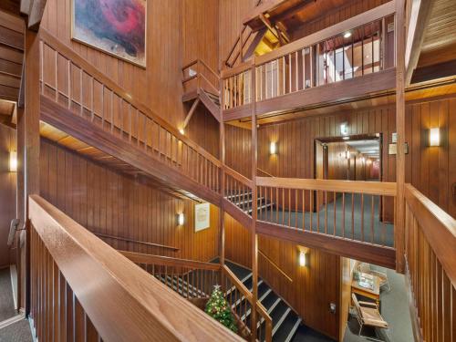 an overhead view of a building with wooden stairs at Thredbo Alpine Hotel in Thredbo
