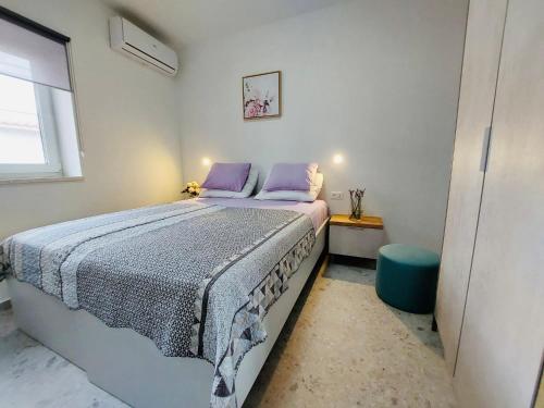 Postel nebo postele na pokoji v ubytování Kuća za odmor Svelena Vodice