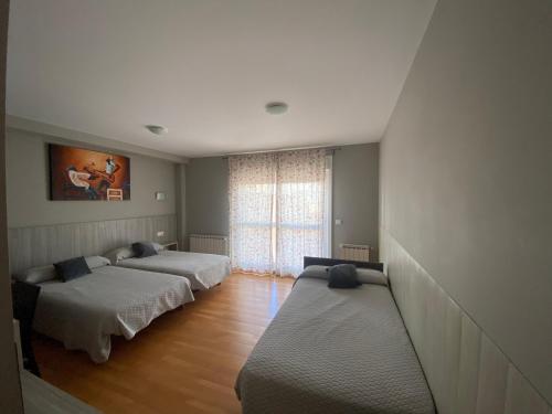 Katil atau katil-katil dalam bilik di dpCristal Castelao