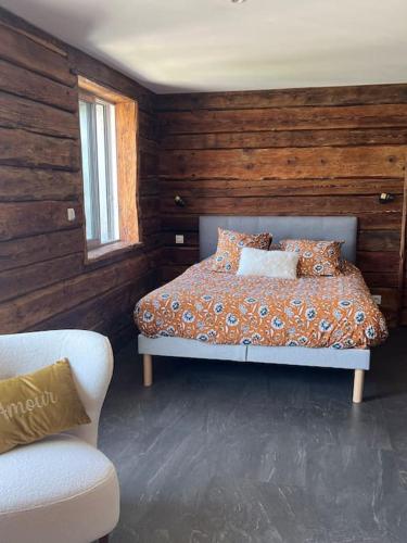 מיטה או מיטות בחדר ב-Appartement chalet avec sauna 3*