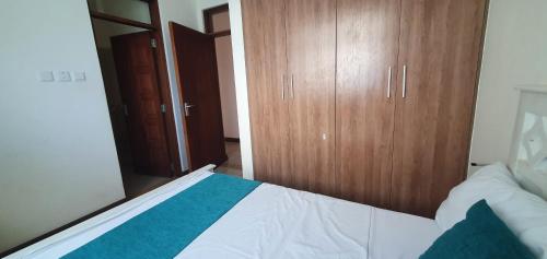 Ein Bett oder Betten in einem Zimmer der Unterkunft Penthouse Five - The Beautiful 3Br En-suite Apt