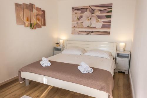 Katil atau katil-katil dalam bilik di Holiday Home Antony