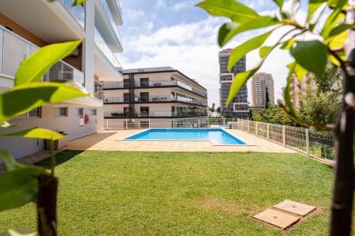 Bright New Apartment with Pool in Portimão - 5 Min Walk to the Beach by Lisbeyond