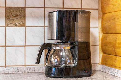 a coffee pot sitting on top of a counter at Blockhaus Günther und Brigitte Serr in Lauf