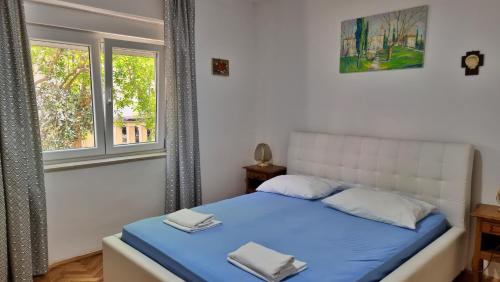 Postel nebo postele na pokoji v ubytování Apartments Iko Nemira