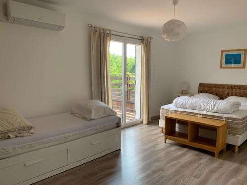 Postel nebo postele na pokoji v ubytování Villa Le Chêne Vert