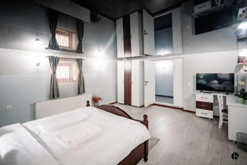 Et tv og/eller underholdning på Dadi House