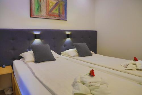 Cama o camas de una habitación en Apartments Oeneus