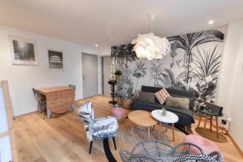 Marché Arago (3min), plage (8min), jardin clos.