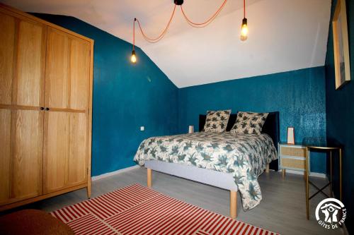 Postel nebo postele na pokoji v ubytování Gîte Aussos