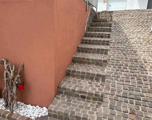 a set of stairs next to a building at Am Wiesental in Steinbuch