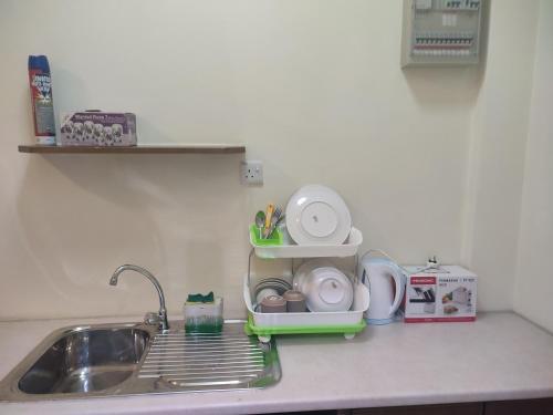 Cuisine ou kitchenette dans l'établissement Sofea Inn Bukit Merah - Laketown A6172