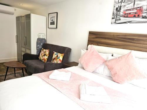 Letto o letti in una camera di Camden Prime ApartHotel