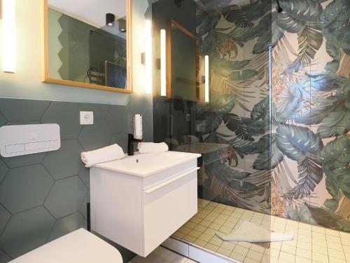 Koupelna v ubytování Seebrücke Heringsdorf - Appartement mit 2 Schlafzimmern und Terrasse S22