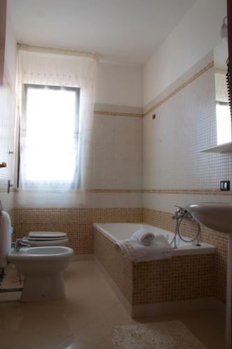Ένα μπάνιο στο Residence Le Saline