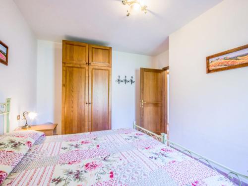 Ένα ή περισσότερα κρεβάτια σε δωμάτιο στο Apartment Montereggi-5 by Interhome