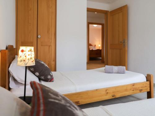 Katil atau katil-katil dalam bilik di Apartment Domaine des Reines C10 by Interhome
