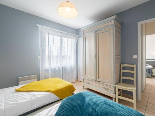 En eller flere senge i et værelse på Apartment Côte Sud-4 by Interhome