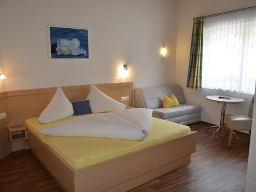 Posteľ alebo postele v izbe v ubytovaní Apartment Apart Garni Wachter-1 by Interhome