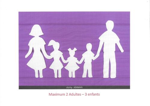 a white paper cut out of a family at Chouette appartement 5 personnes in De Haan