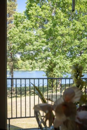 a view of a lake from a balcony at Holiday Home Norrviken by Interhome in Unnaryd