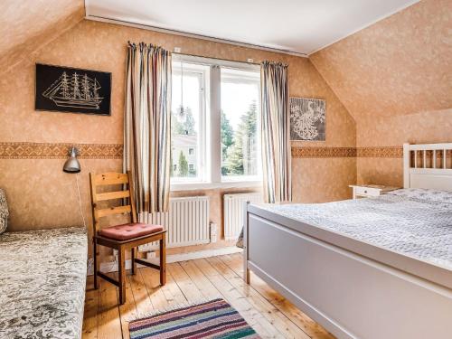 Postel nebo postele na pokoji v ubytování Holiday Home Ilingetorp by Interhome