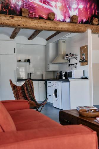 Η κουζίνα ή μικρή κουζίνα στο Apartamentos One