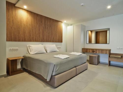 Katil atau katil-katil dalam bilik di Hotel Athina