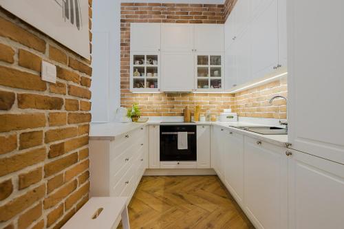 Kuchyň nebo kuchyňský kout v ubytování Woronicza - Margo Apart