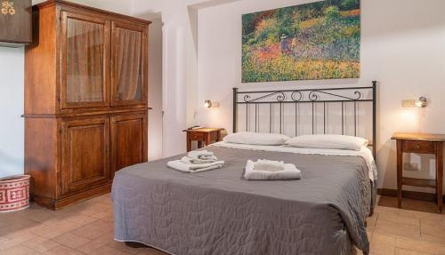 A bed or beds in a room at Agriturismo Al Girasole