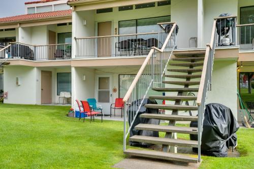 a set of stairs leading up to a house at Lovely Crescent Bar Condo with Community Amenities! in Quincy