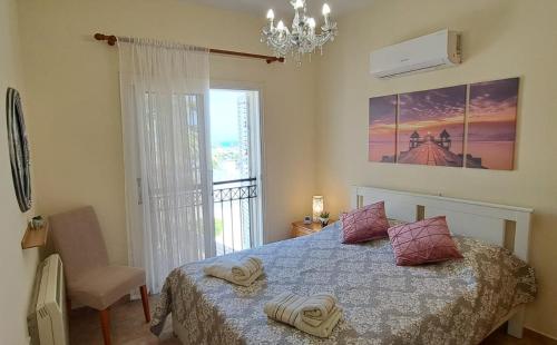 Postel nebo postele na pokoji v ubytování VILLA MARINA BY FIG TREE BAY
