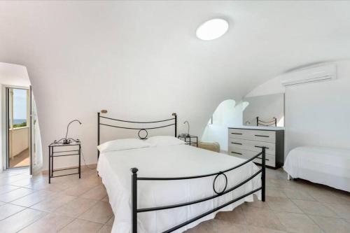 מיטה או מיטות בחדר ב-Casa Margherita