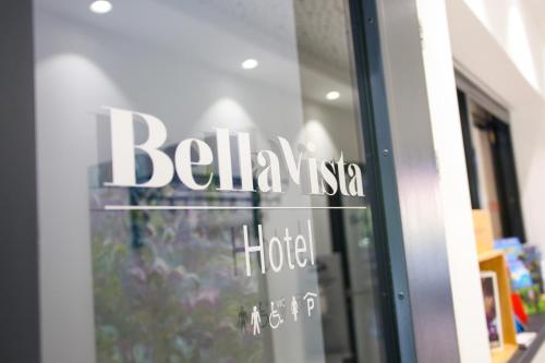 a sign on a window of a hotel at Hotel Bellavista Locarno in Locarno