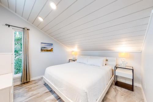 Кровать или кровати в номере Tranquil Cottage
