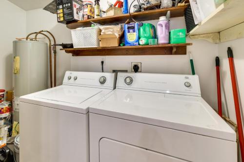 a laundry room with a washer and dryer at Eureka Springs Vacation Rental Less Than 1 Mi to Downtown in Eureka Springs