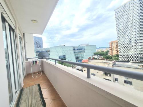 a balcony with a view of a city at Sandra's Apartment in Tirana Center in Tirana