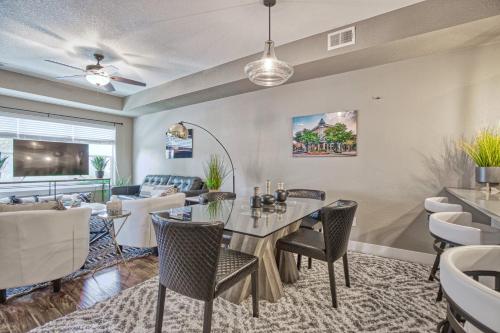 a dining room with a table and chairs at 2 Bedroom townhome, super close to downtown FC! in Fort Collins