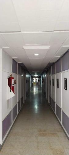 an empty hallway in an office building at 2 Hotel Saleh in Angeles
