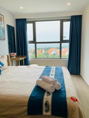 Postel nebo postele na pokoji v ubytování The Sóng Condotel in Vung Tau City - The Sóng Real Company