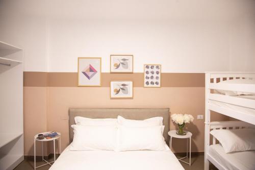 Llit o llits en una habitació de Lulu Suites - Moka