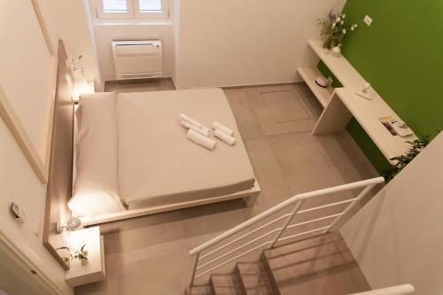 an overhead view of a staircase with a refrigerator at A Casa di Nonna in Bisceglie