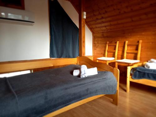 Postel nebo postele na pokoji v ubytování Idill Üdülőház
